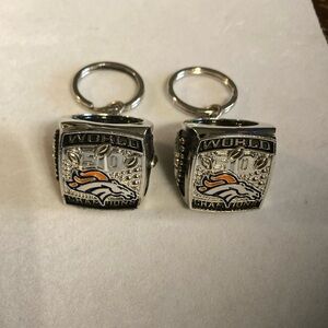 Denver bronco’s ring style keychains ! Not open to wear on fingers . Keychains